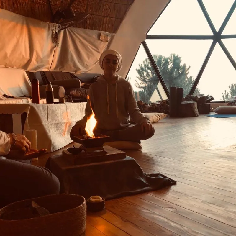 Meditation in a wooden dome yoga hall